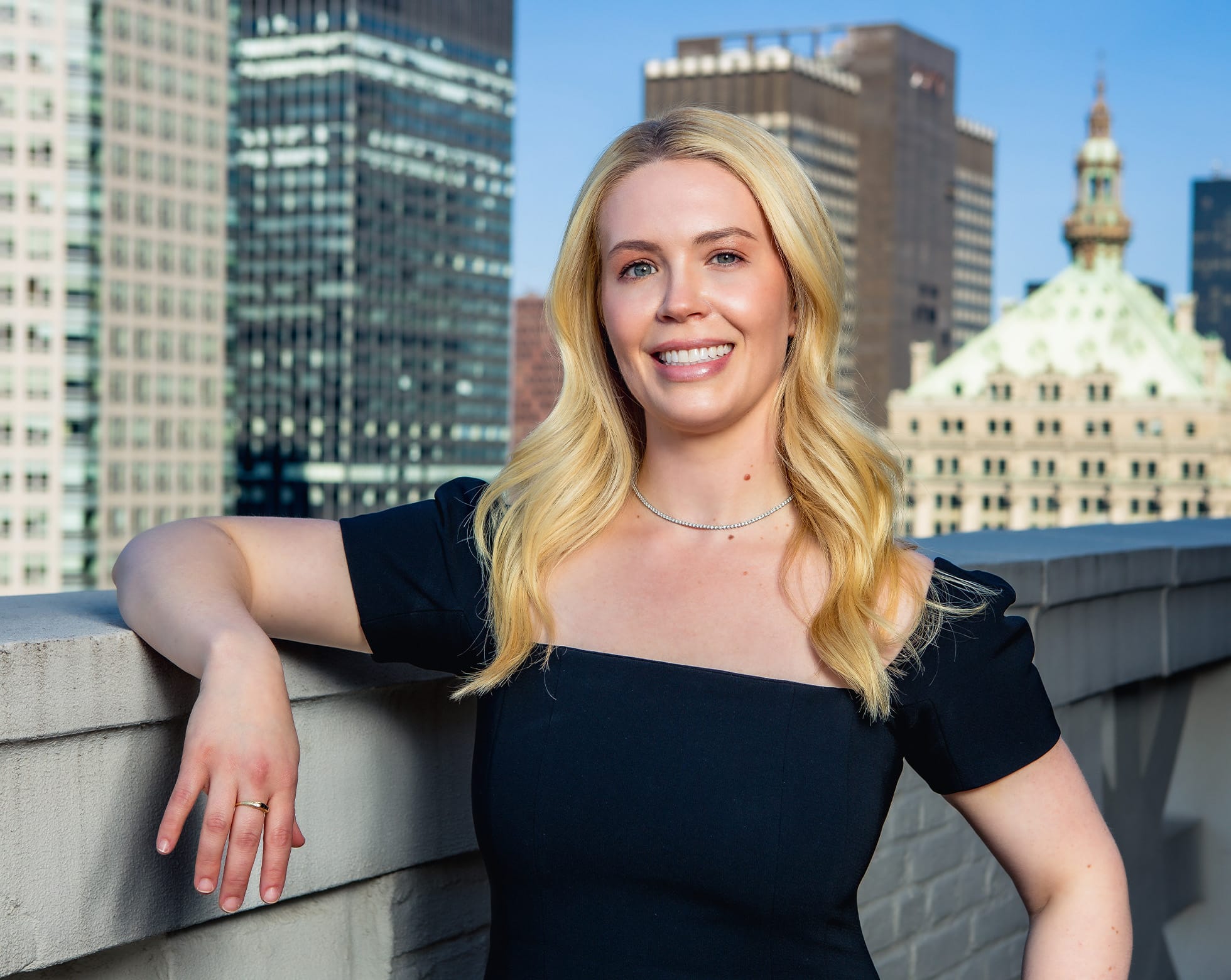 Woman smiling on a balcony